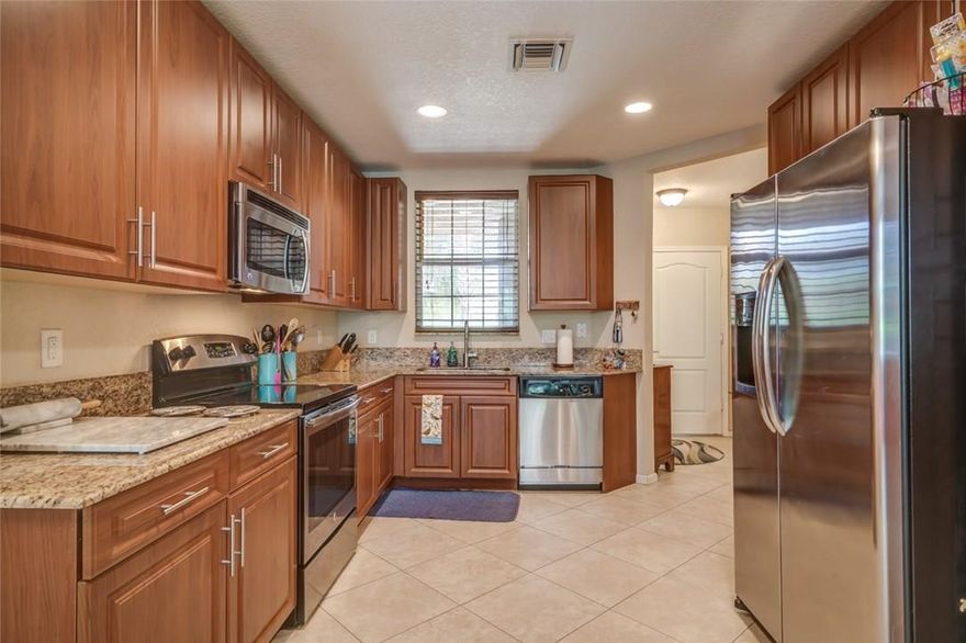 Beautiful 3yr old Townhouse 1851sq' 3BR,2.5baths, Townhouse,2 car garage, Family Rm, Living Rm, Dining Rm,  Lg Eat-In Kitchen w extended height cabinets, granite counters, stainless appliances 1st fl tiled,-2nd fl Carpet. MBR bath w dual sinks, roman tub, semi-frame-less shower. MBR has a decorator tray ceiling. Impact windows, hurricane rated garage door. 10’X 15’brick Paver patio w automatic Sun Setter screen awning. Community Pool, playground, lake with walking trail. Pet-Friendly/ By Appointment ONLY.