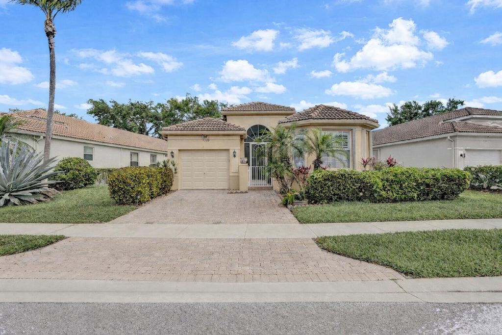 Photo of 7229 Cataluna Circle, Delray Beach, FL 33446 (MLS # B26011862)