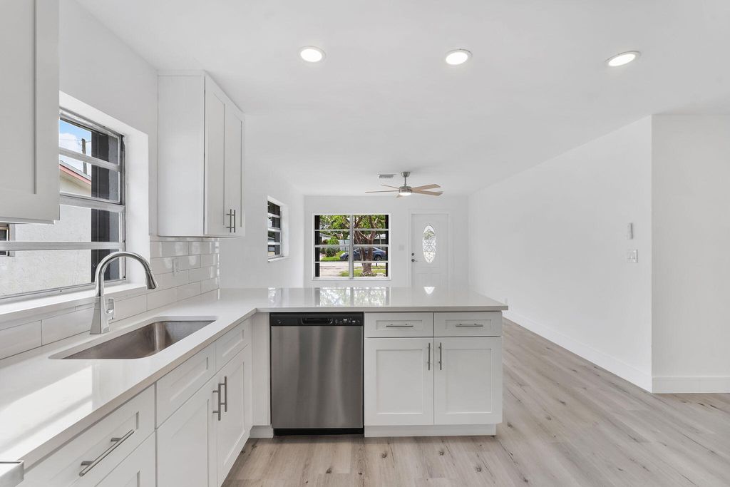 Photo of 488 NW 2nd Terrace, Deerfield Beach, FL 33441 (MLS # B26046817)