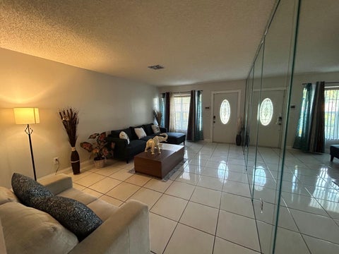 Tiny photo for 7526 SW 7th Court, North Lauderdale, FL 33068 (MLS # B26045988)