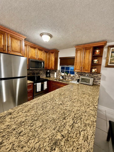 Tiny photo for 7526 SW 7th Court, North Lauderdale, FL 33068 (MLS # B26045988)
