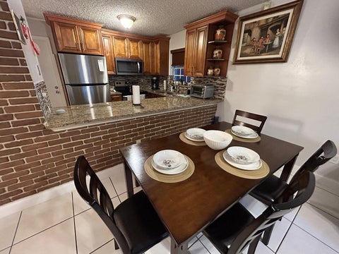 Tiny photo for 7526 SW 7th Court, North Lauderdale, FL 33068 (MLS # B26045988)