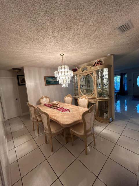 Tiny photo for 7526 SW 7th Court, North Lauderdale, FL 33068 (MLS # B26045988)