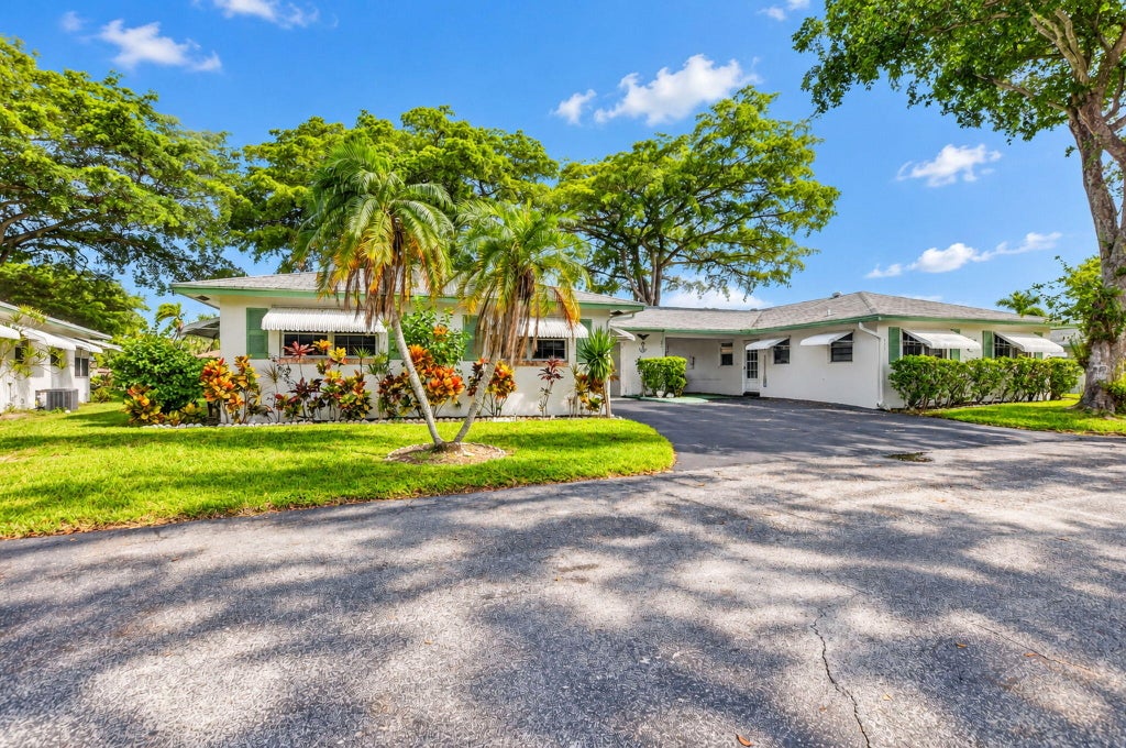 Photo of 843 Meadowlark Lane, Delray Beach, FL 33445 (MLS # B26083717)