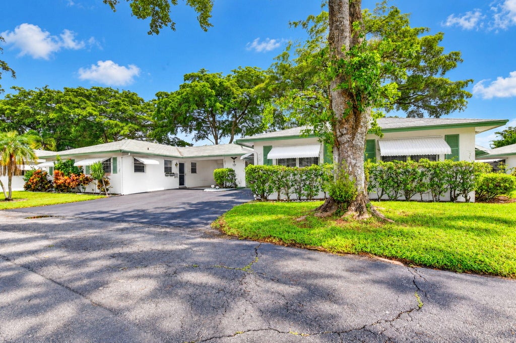 Photo of 843 Meadowlark Lane, Delray Beach, FL 33445 (MLS # B26083717)