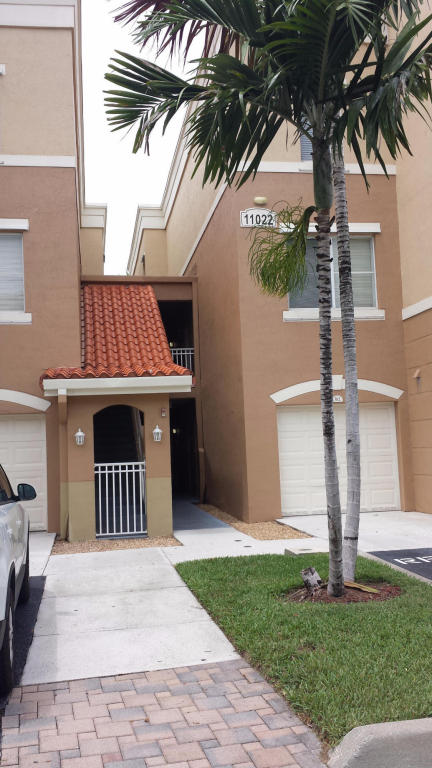 In the heart of Palm Beach Gardens, Located on corner first floor with lots of light. Freshly painted, cleaned and ready for move in. Each bedroom has private bath oversized kitchen with lots of cabinets, counters and a built-in computer station/desk. Includes full-size washer/dryer, walk-in closets and outdoor covered patio. Water & 1 private parking space included in rent. Community has electronic security gate, gorgeous resort-style pool, tennis and clubhouse with fitness center. Small dog under 20 lbs. or cat permitted with $250 non-refundable pet fee