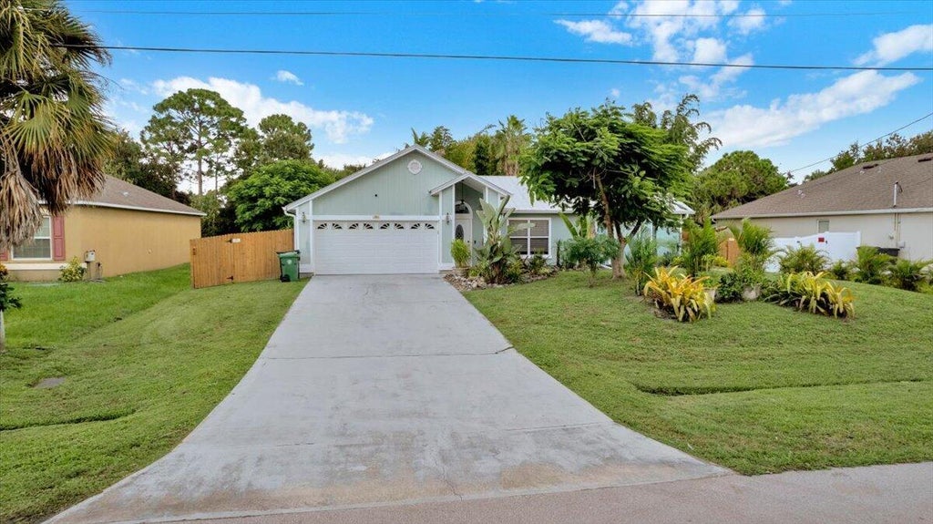 Photo of 2513 SW CALENDER Street, Port Saint Lucie, FL 34953 (MLS # B26078892)