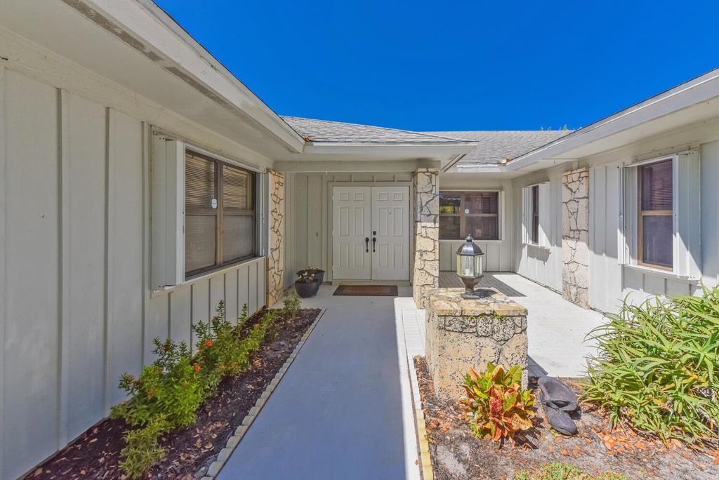 Photo of 12812 SE Royal Troon Court, Hobe Sound, FL 33455 (MLS # R11128684)