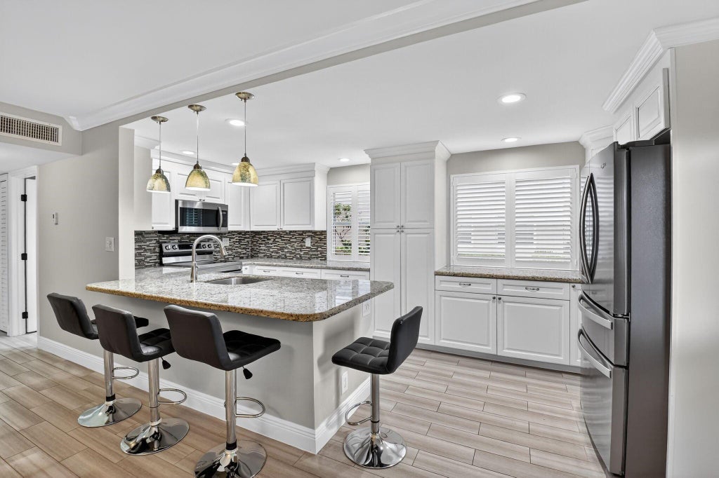 Photo of 311 Capri G, Delray Beach, FL 33484 (MLS # R11037180)