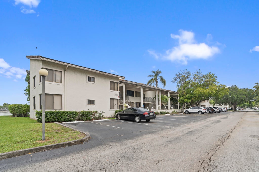 Photo of 3100 NW 46th Street #107, Oakland Park, FL 33309 (MLS # B26033554)