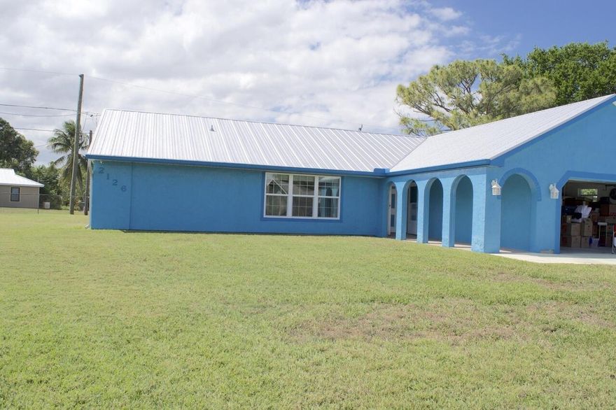 This beautiful house has a metal roof installed in 2017, new AC in 2018, impact windows and Accordion hurricane shutters have been installed in 2010. It has been recently repainted! It also has a full house generator with an in-ground 500 gallon propane tank! The house also comes with newer appliances, about a couple of years old, an alarm system, and an immaculate look . Also, wheelchair accessible, therapeutic tub.  tile  throughout the house. The master bedroom has enough room for the bed, a dresser and a pretty big office desk. The back yard has a shed, and well sprinkler system. Do not miss the opportunity to own a beautiful house in a great neighborhood close to everything!