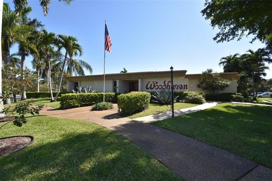 Beautiful 2 bedroom, 2 bath 1st floor unit in Woodhaven Condos in Boca Raton. A 55+ community, with all the amenities. Unit has large bedrooms, tile throughout, open and bright, patio with landscaping. Amenities include billiard room, exercise room, clubhouse, kitchen facilities, pool, library. What more can you ask for!!! This wont last long.