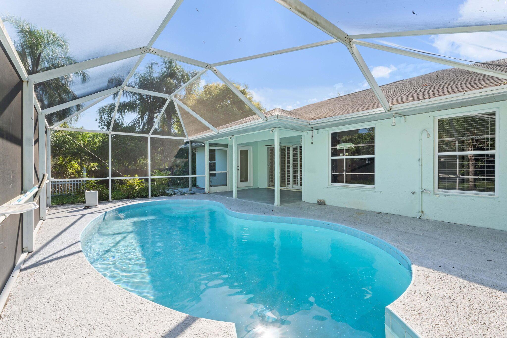 One of the best priced pool homes in Port Saint Lucie. This 2-bedroom, 2 bath home with a den that could easily serve as a 3rd bedroom is perfect for a homeowner looking to create instant equity. This home is ready to be customized by its new owner, with a roof that is only a few years old.