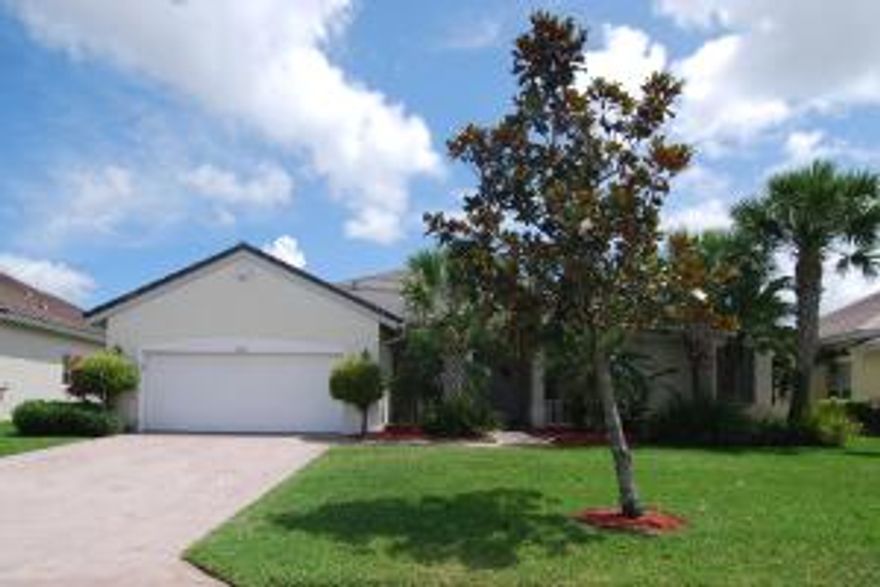 Open, spacious CBS 3/2/2 Solar heated POOL HOME IN MAGNOLIA LAKES. Over 2400 under air, this home has high ceilings throughout, large living area and family room with separate dining area. As you enter the home through the doubled door front entrance, you catch a captivating view of the pool area . The master bath area is huge with plenty of closet space, roman tub, separate shower, dual sinks and a dressing area. Large kitchen makes entertaining a breeze. Enter the screened patio pool area through glass sliders from the living room, family room and master bedroom. Located in gated community offering pool, clubhouse, exercise, tennis and more.Situated at the end of a cul-de-sac on an oversized lot.