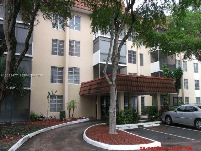 Photo of 4154 Inverrary Drive #205, Lauderhill, FL 33319 (MLS # A12022477)