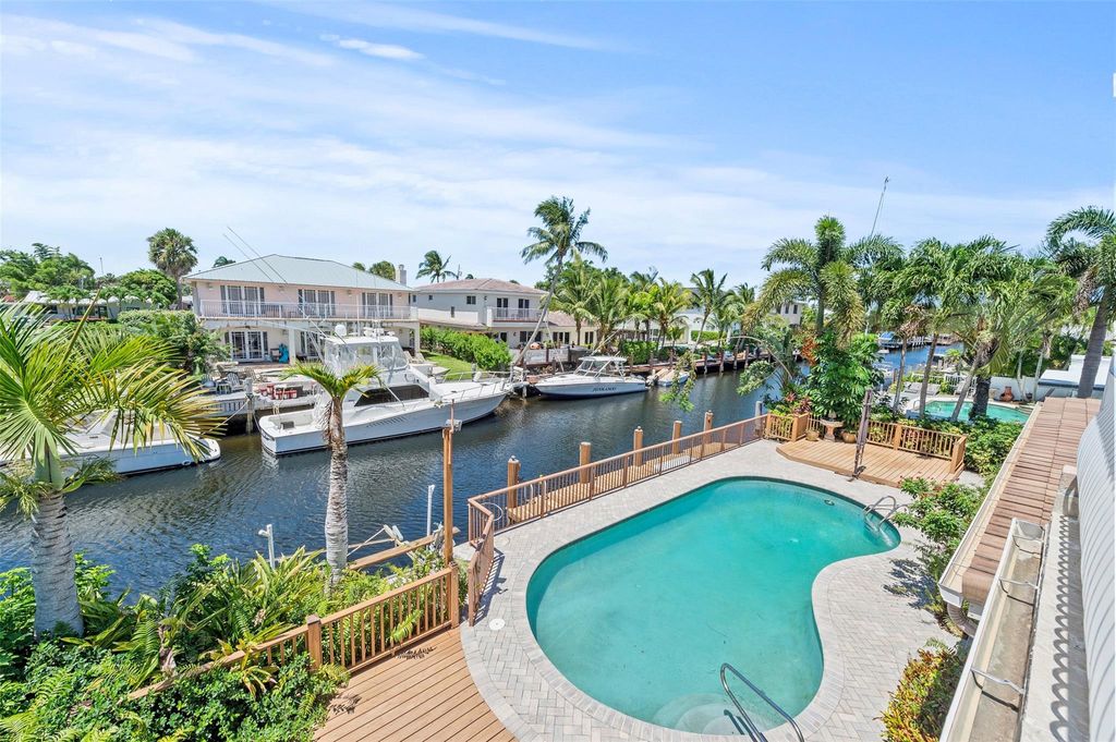 Photo of 1317 Guava Isle, Fort Lauderdale, FL 33315 (MLS # F10508865)