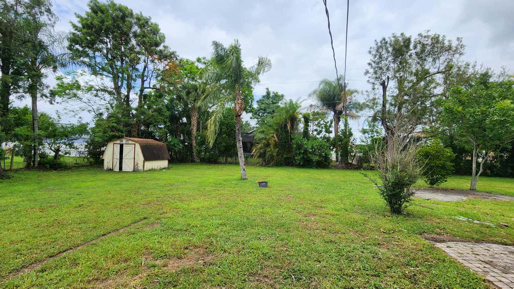 Photo of 461 SW Buxton Avenue, Port Saint Lucie, FL 34983 (MLS # B26018941)