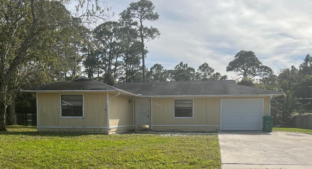 Photo of 7001 Pacific Avenue, Fort Pierce, FL 34951 (MLS # R10947115)