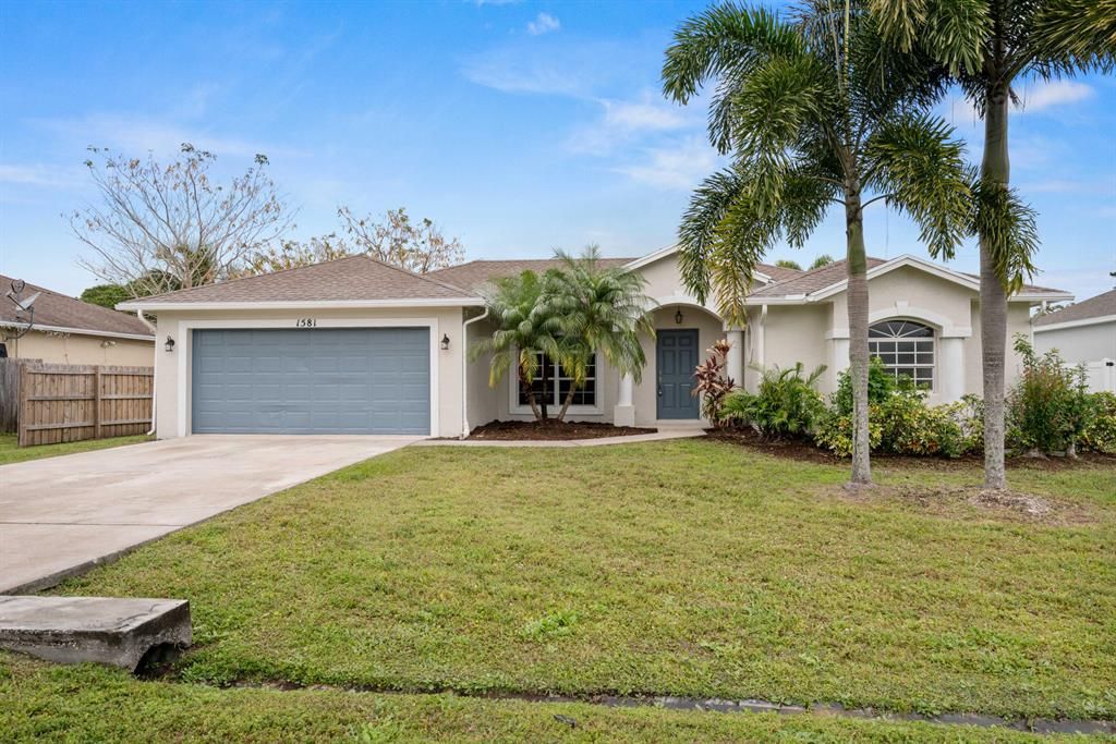 Photo of 1581 SW Pitts Avenue, Port Saint Lucie, FL 34953 (MLS # R10772437)