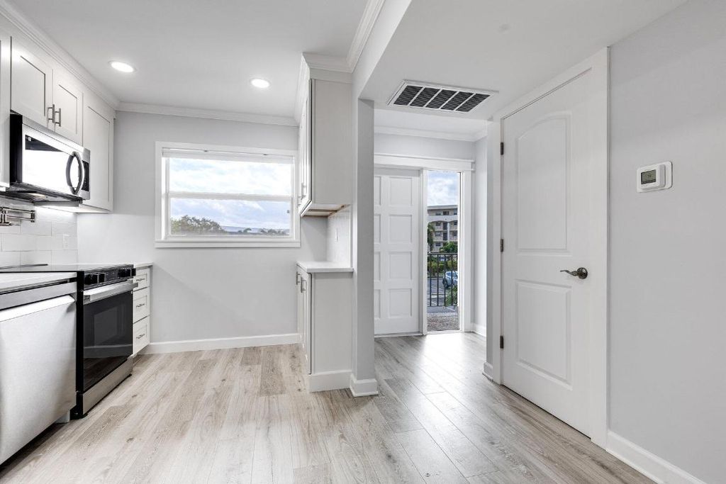 Photo of 28 Yacht Club Drive #207, North Palm Beach, FL 33408 (MLS # R11103953)