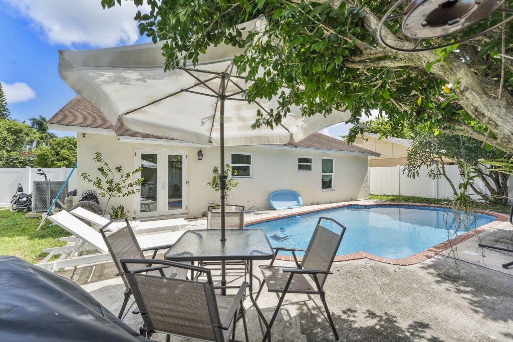 Photo of 14529 Sunset Pine Drive, Delray Beach, FL 33445 (MLS # B26088073)