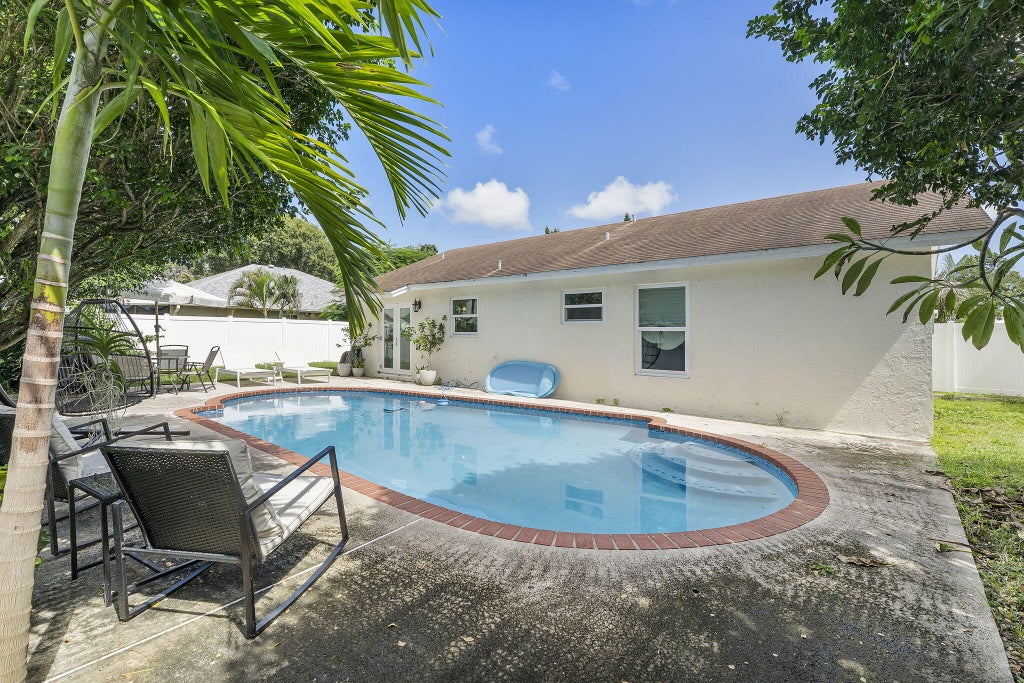 Photo of 14529 Sunset Pine Drive, Delray Beach, FL 33445 (MLS # B26088073)