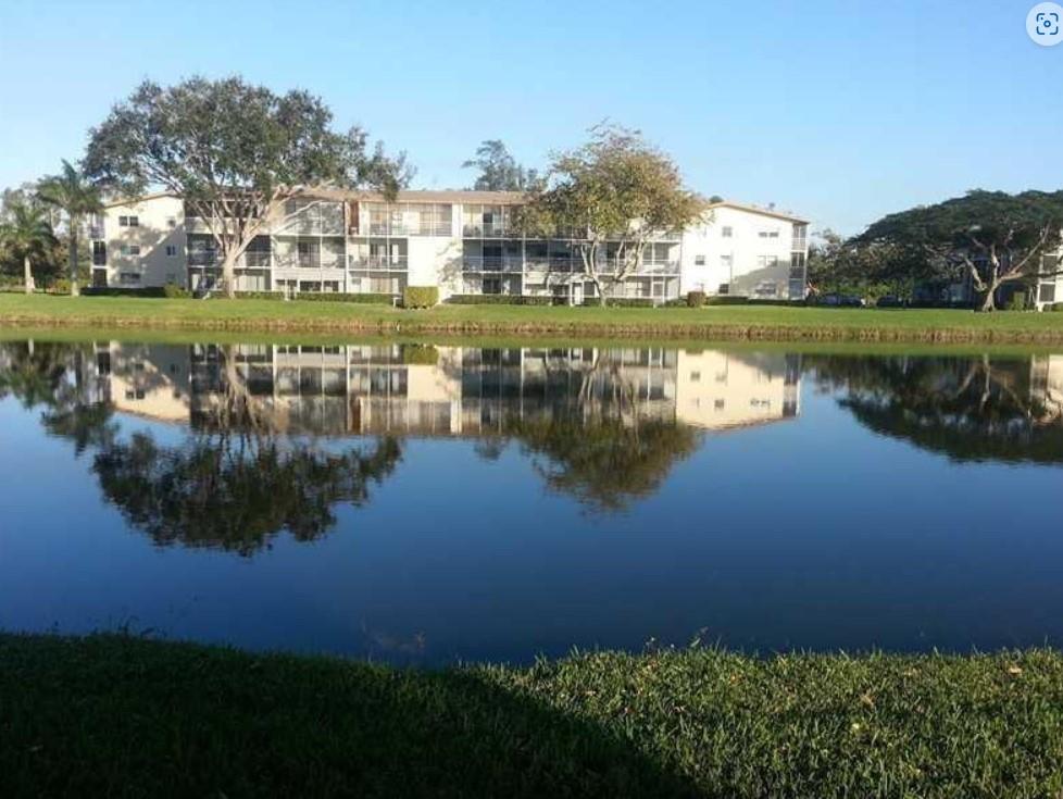 55+ COMMUNITY! The largest 1BD in Century Village with spacious screened balcony w tranquil large LAKE
VIEW! Enjoy South Florida Weather in your private balcony or enjoy everything this community has to offer! Unit
features double size living room. Unit has very spacious dining room, bedroom and walk in closet. Unit across
from laundry facility for easy access. Building offer elevator for your convenience. Come live in a community that
allows you to enjoy the tropical weather. Community offers: great amenities, pool, theatre, classes and courtesy
buses from your building. Enjoy the simple and easy lifestyle this community offers.
