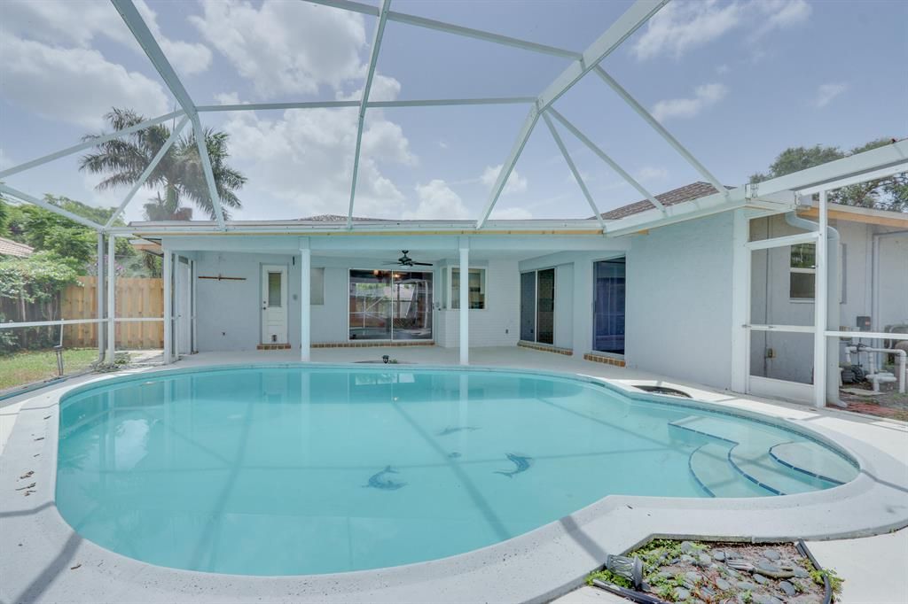 Photo of 1027 SW 7th Street, Boca Raton, FL 33486 (MLS # R10743513)