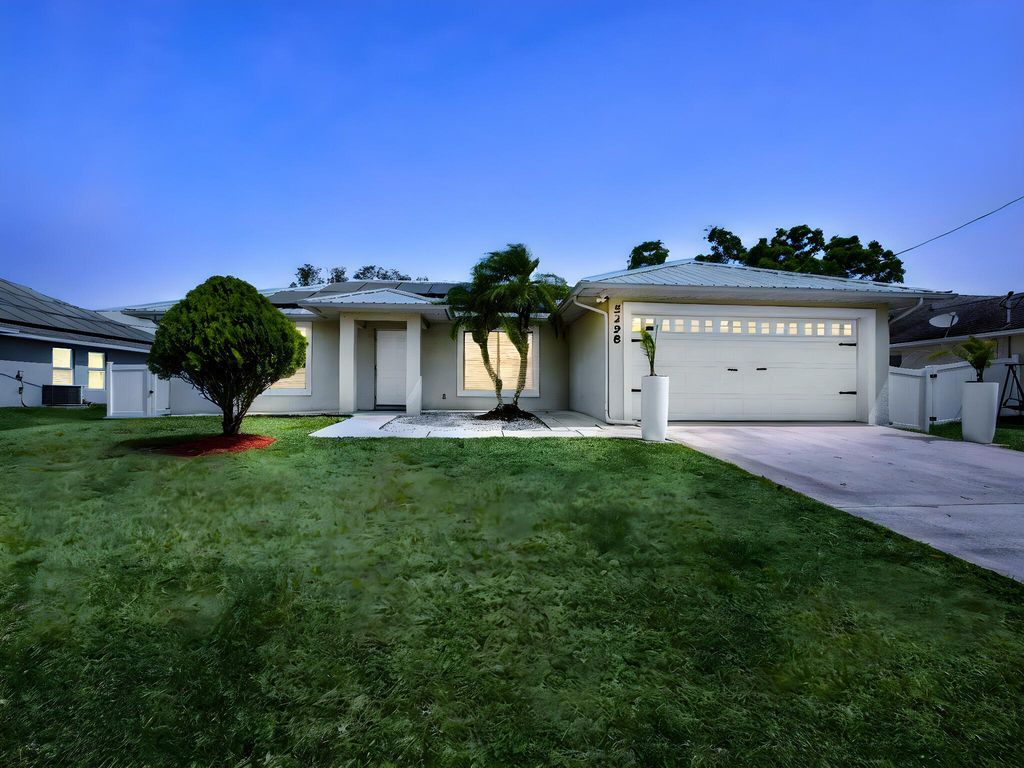 Photo of 5298 NW North Macedo Boulevard, Port Saint Lucie, FL 34983 (MLS # R11089416)