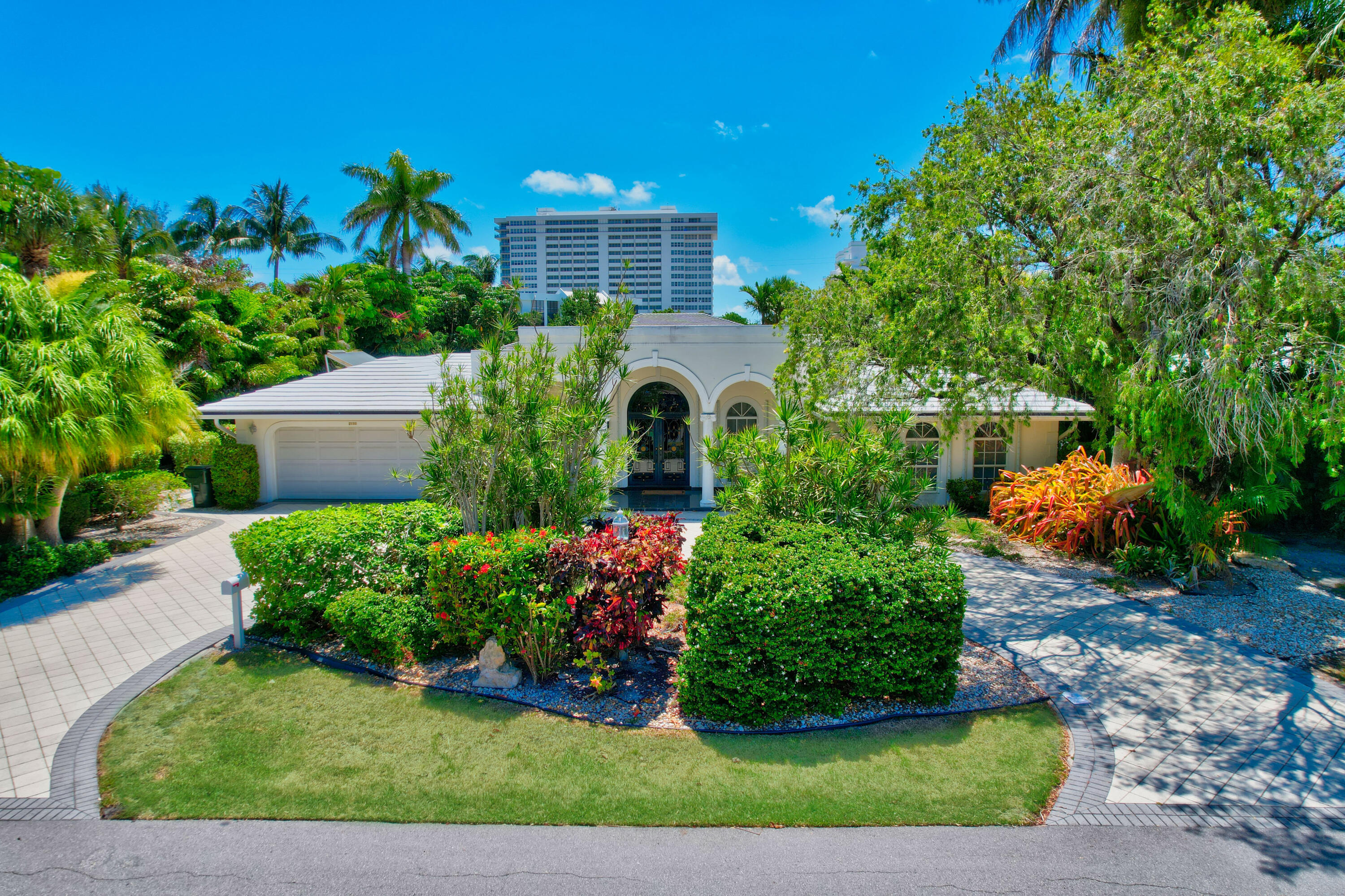 Coastal Luxury Meets Timeless Elegance.Steps from the sand in prestigious Spanish River Land Estates, this private beachside retreat is pure paradise. Lush tropical landscaping, private resort-style pool, and outdoor living spaces create the ultimate setting for relaxation and entertaining.Inside, coastal-inspired design meets timeless sophistication -- airy living spaces, a chef's kitchen, and flexible rooms for work or play. Just steps across the street from the beach and a few minutes to downtown Boca Raton, Mizner Park, and world-class dining, shopping, and culture. This is the lifestyle you've been dreaming of -- and it's ready for you.