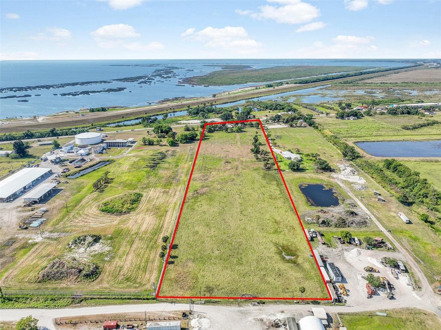 Seize this rare opportunity to develop 11.71 acres in the designated "Resort Corridor", one of Okeechobee’s most sought-after development zones! Half a mile from Parrot Ave (HWY441/US 98) & less than 1,500’ from Lake Okeechobee Park. Lake O' is a premier destination for bass fishing tournaments. These events draw anglers & visitors from around the World, making this a prime location for a resort, hotel, restaurant, all types of residential including tiny homes, cottages, townhomes, etc. Anything related to tourism! Okeechobee is undergoing a massive transformation. As growth surges & demand rises, this parcel presents an even greater investment opportunity. Don’t miss this rare chance to claim a key piece of Okeechobee’s future—Contact Us Today! Tenants month-month. Selling for land value.