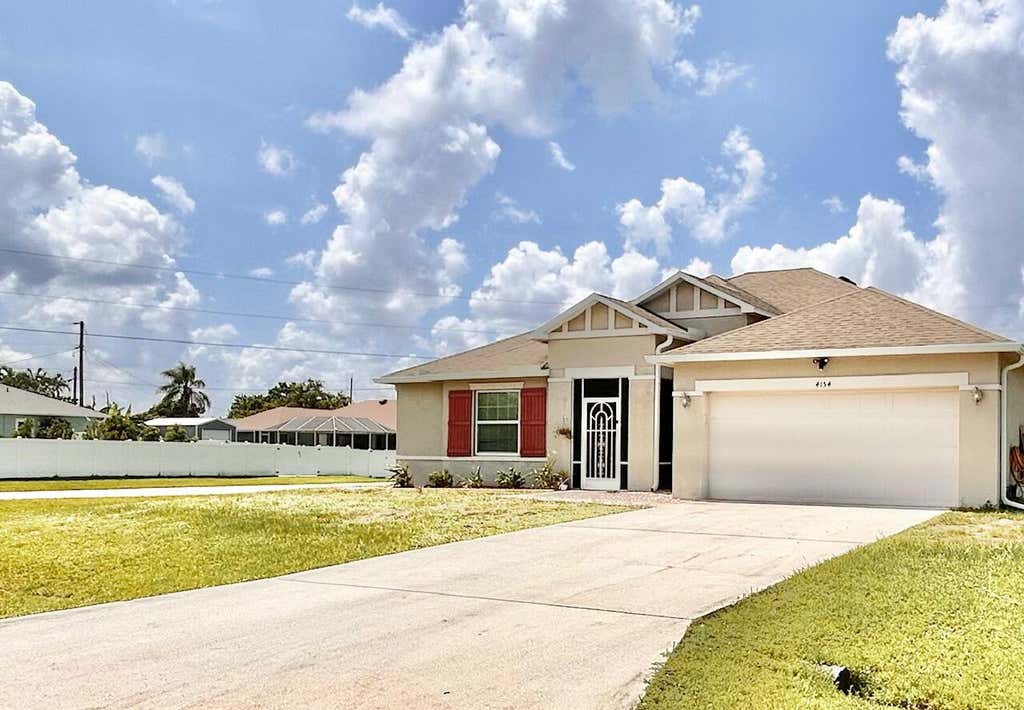 Photo of 4154 SW ELBA Street, Port Saint Lucie, FL 34953 (MLS # B26064011)