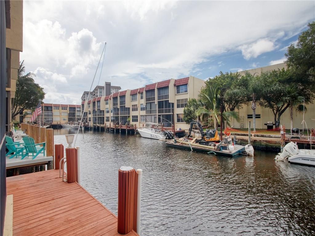 Photo of 777 S Federal Hwy Hwy #M105, Pompano Beach, FL 33062 (MLS # F10342850)