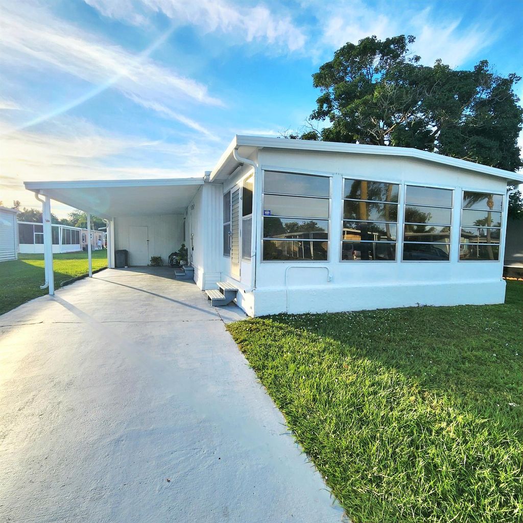 Photo of 12 La Costa Lane, Port Saint Lucie, FL 34952 (MLS # R11140640)