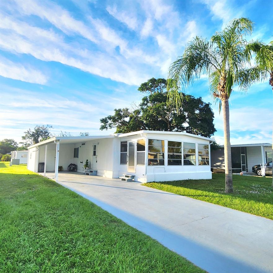 Charming 2 bed/2bath - Partially Furnished w/ a large Florida room perfect for a home office, 2nd living room, pet or plant room! Flooring replaced. Ample storage inside & out. Large shed available. This house is nestled in a peacefully quiet, yet active, 55+ community. You will be pleased w/ this prime location; close to the beach, mall, grocery stores, shopping, post office, banks, pharmacies, hospitals & more. Lot lease of only 930.98 includes security, cafe, Clubhouse w/activities, lawn care, trash, free private golf course, bingo, heated pool, pickleball, tennis, workshop, shuffleboard, bocce, gym, library, cards, Mahjong, clubs & more! Grab your slice of paradise in the highly desired town of Port St Lucie!
