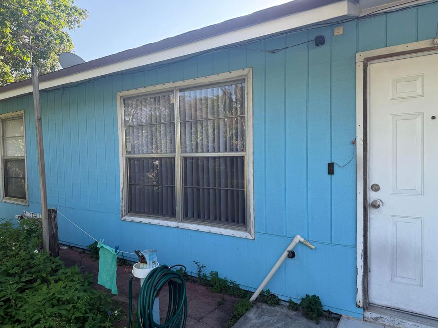 Charming 3-Bedroom, 2-Bath Home in West Palm Beach! Welcome to 4666 E Holt Rd - a well-maintained single-story home built in 1983 on a spacious 6,450 sq ft corner lot in the Holt Estates area. This 1,104 sq ft residence offers a functional split-bedroom layout, parquet wood flooring, bright living/dining area, and an upgraded kitchen with appliances. The master suite includes a walk-in closet, plus indoor laundry and central air/heat for everyday comfort. Outside you'll love the fully fenced yard and attached 1-car carport. No HOA, low taxes (~$1,052), and convenient access to shopping, dining, major roads, and top-rated schools.