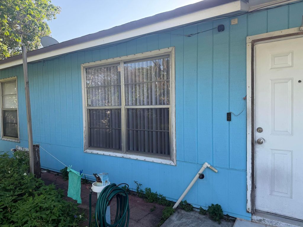 Photo of 4666 E Holt Rd, West Palm Beach, FL 33415 (MLS # B26014382)