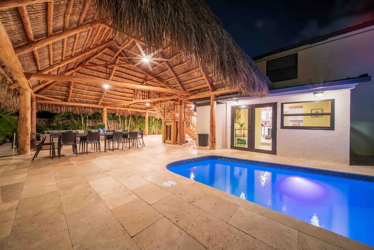 : AVAILABLE FOR SEASONAL RENTAL,OFF SEASONAL RENTAL OR ANNUAL RENTAL. PRICES VARY/FLEXIBLE ON LEASE TERM.*PRICE LISTED IS ANNUAL RENT/OFF SEASON SUMMER RENT. Spacious 4 bedroom 3 bathroom Tiki home located minutes from Delray Beach & Downtown Atlantic Ave. Our recently renovated home includes 3 suites with king sized beds/private bathrooms and 1 room with 2 queen sized beds & a sofa bed. Large kitchen, dining/living area leads to private back yard featuring a stunning Tiki Hut & loft, saltwater heated pool surrounded by palm trees.