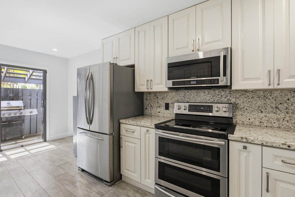 Photo of 1512 N 15th Terrace, Hollywood, FL 33020 (MLS # B26038491)