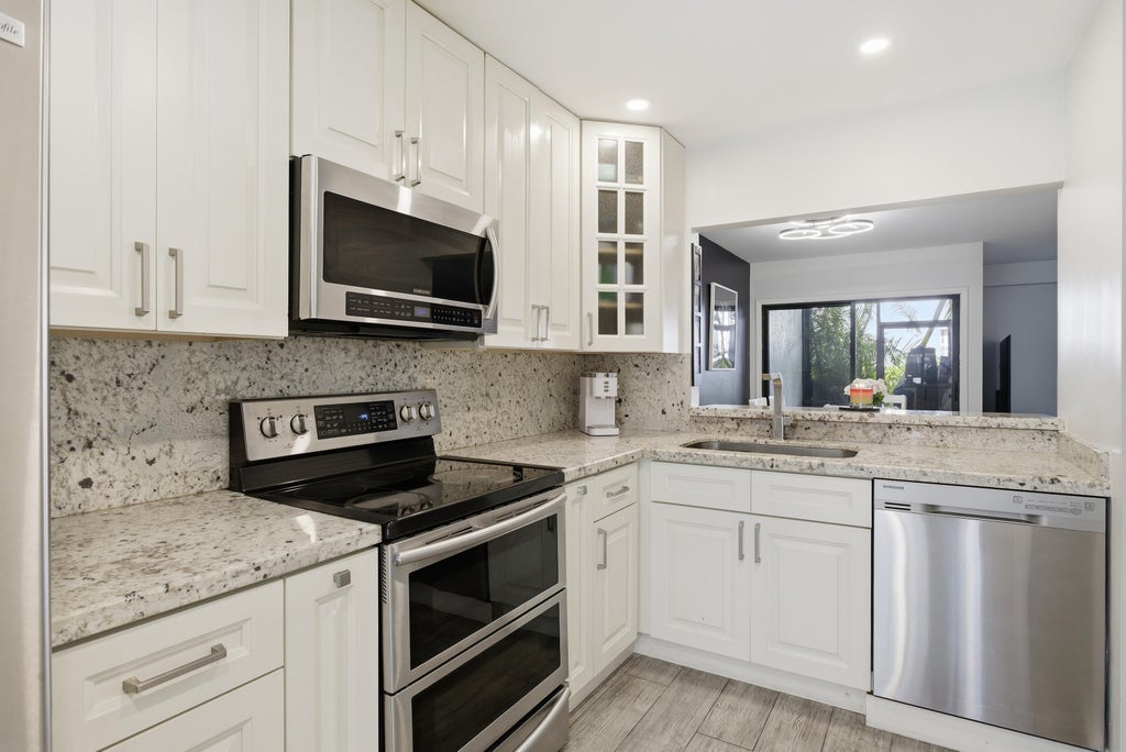 Photo of 1512 N 15th Terrace, Hollywood, FL 33020 (MLS # B26038491)