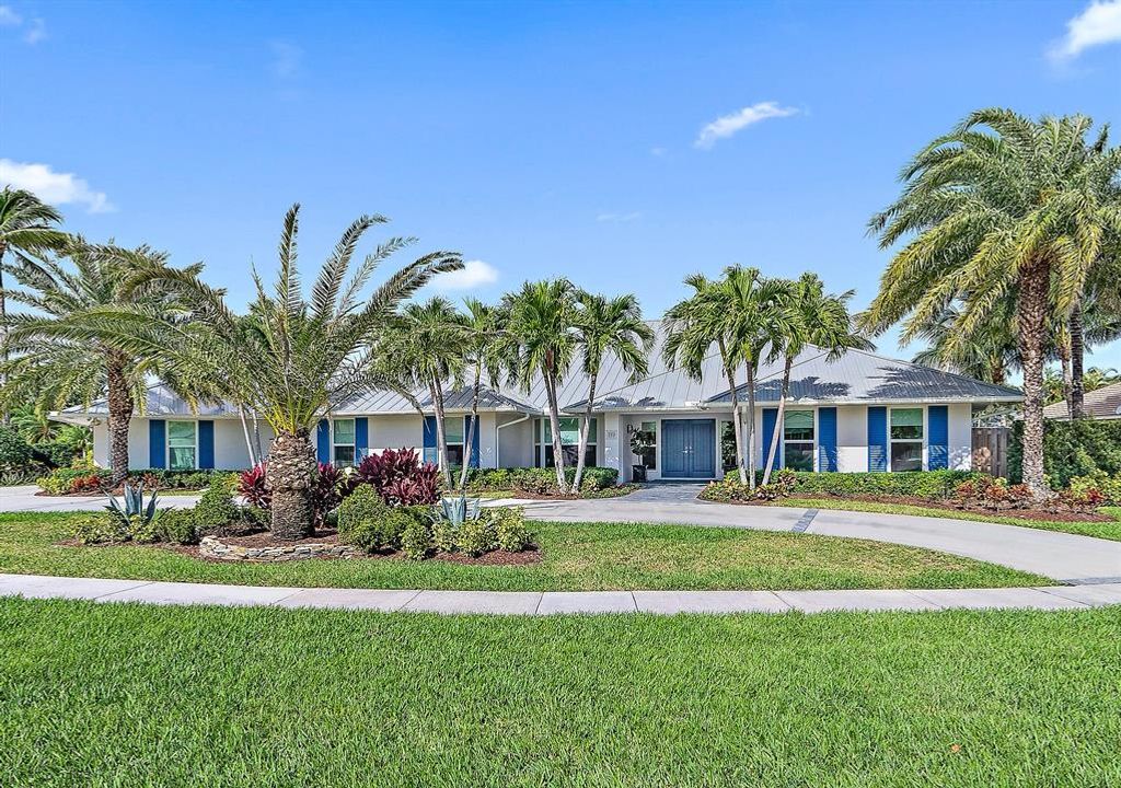 Photo of 119 Olympus Way, Jupiter, FL 33477 (MLS # R10865989)