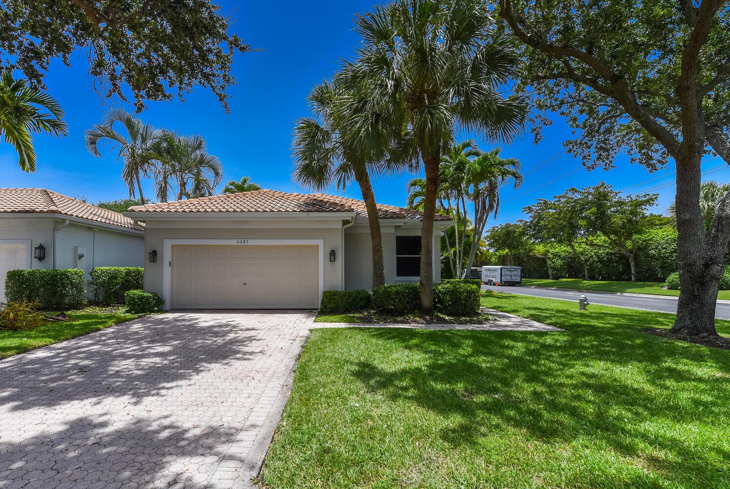 Newly renovated. Clean contemporary, open concept. Rarely available Old Course membership included as well as all Broken Sound Club has to offer One story, 2 bedroom plus den/office, 2 bath home. The oversized pool/patio area is lushly landscaped for privacy. The kitchen has quartz countertops and stainless steel appliances. Stone flooring in main living areas and wood floors in bedrooms.