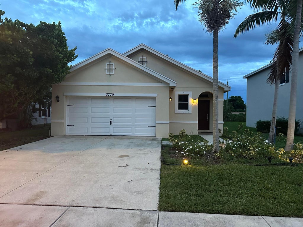 Photo of 3779 WHITNEY PARK Lane, Greenacres, FL 33463 (MLS # B26075566)