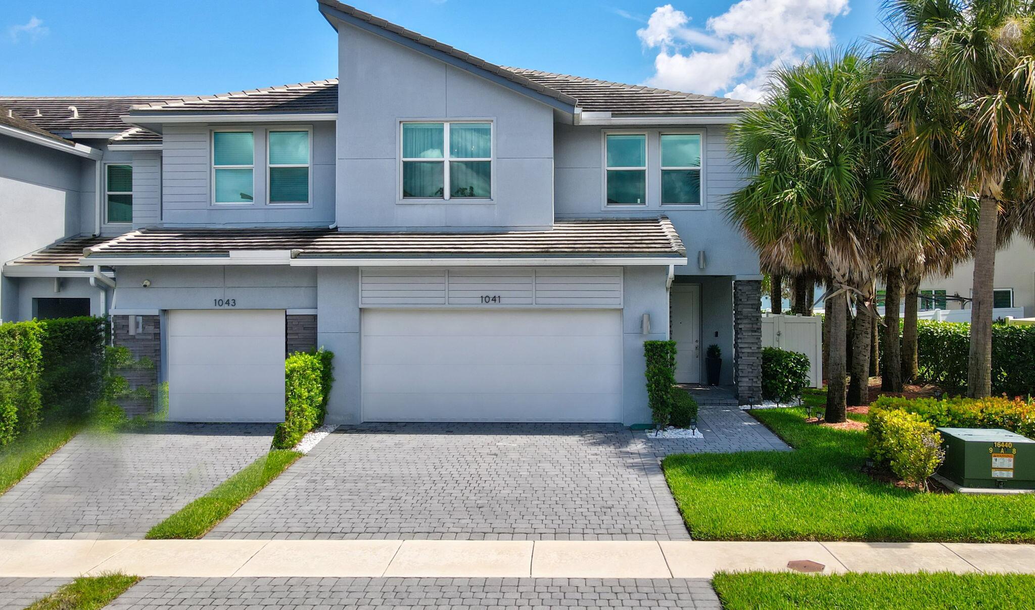 Step into refined living in this elegantly upgraded 3BR, 2.5BA corner townhome in the exclusive gated community of Veleiros. Abundant natural light enhances $50K+ in designer upgrades, including new appliances, a magnificent walk-in pantry, quartz countertops, wood cabinetry, electric blinds, luxury vinyl flooring, and bespoke accent walls. The primary suite features custom built-ins and a spa-inspired bath. A versatile bedroom offers a sleek integrated workspace without sacrificing comfort. Enjoy a reimagined laundry room, epoxy garage floor, hurricane protection. Entertain in your fenced-in backyard oasis with marble pavers, turf, and a solar-lit gazebo. Resort style amenities, low HOA, fitness center, pool, on-site management.
