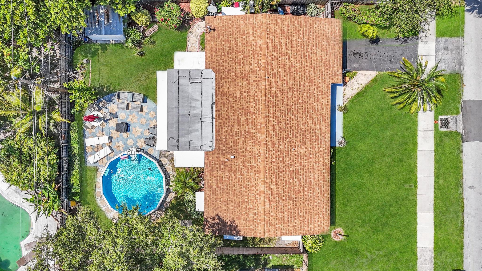 Coastal Cool with a Splash of Fun and No HOA (Bring your Boat)!Tired of cookie-cutter homes? Say hello to your professionally designed, laid-back, sun-soaked slice of paradise located close to Deerfield's most sought after neighborhood: The Cove! This tastefully updated 2-bedroom + office beauty oozes beach house charm and sits quietly tucked away on a peaceful side street--just minutes from Deerfield's Boardwalk on the strand, where flip-flops are practically a dress code.Inside, you'll find a bright, open floor plan that's as easy going as your weekends should be. Need to work from home? There's a large, dedicated office--or what we like to call a Zoom-worthy escape.Ready to relax? Enjoy your sparkling pool, stretch out in the sun or treat your kinfolks to some fine BBQ