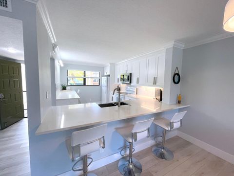 Photo of 13403 Touchstone Place #A-102, Palm Beach Gardens, FL 33418 (MLS # R11125013)