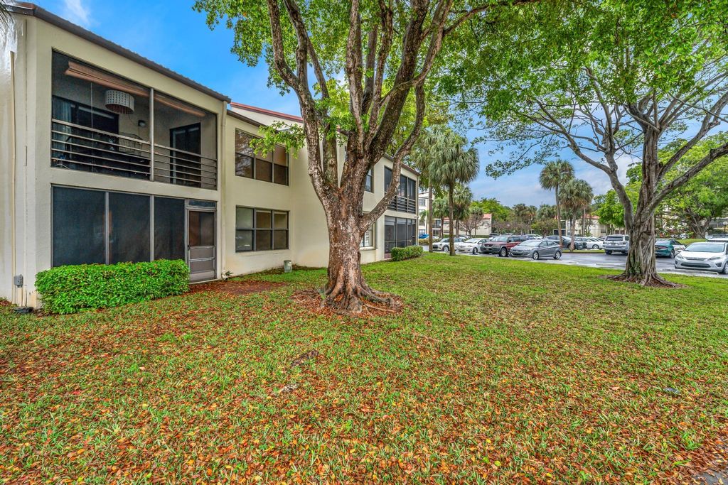 Photo of 2300 S Cypress Bend Drive #102, Pompano Beach, FL 33069 (MLS # F10438642)
