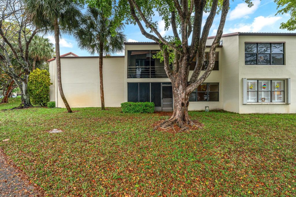 Photo of 2300 S Cypress Bend Drive #102, Pompano Beach, FL 33069 (MLS # F10438642)