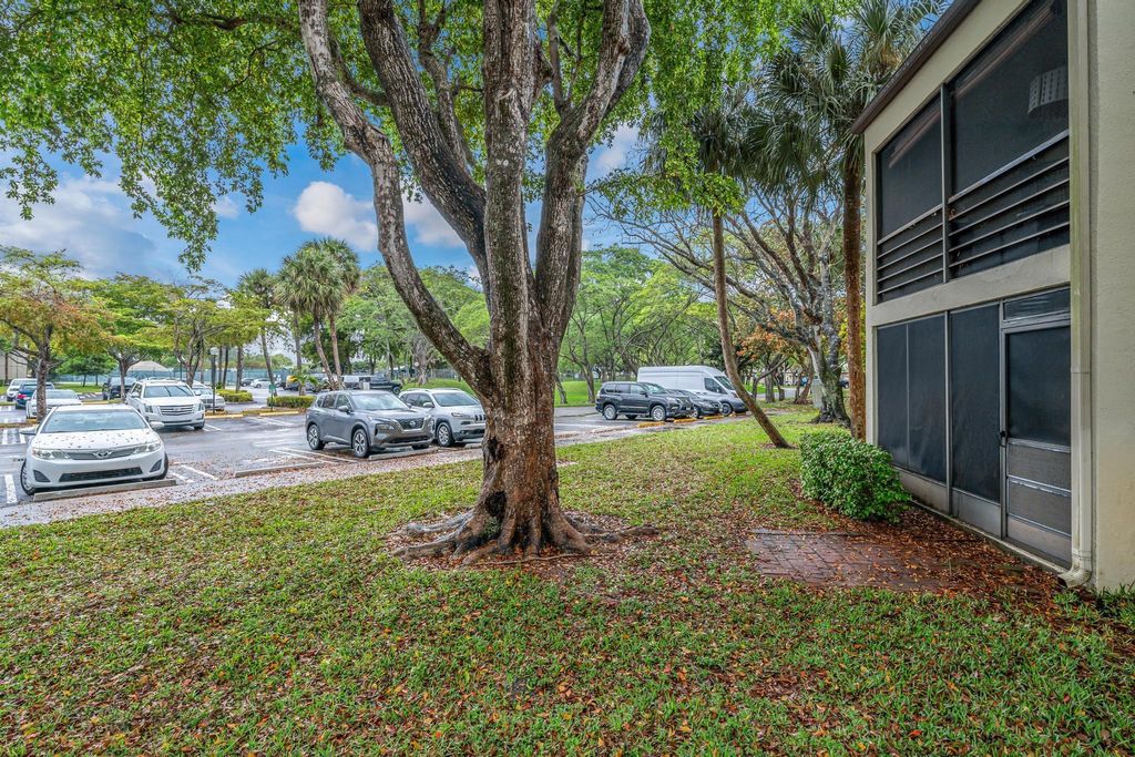 Photo of 2300 S Cypress Bend Drive #102, Pompano Beach, FL 33069 (MLS # F10438642)