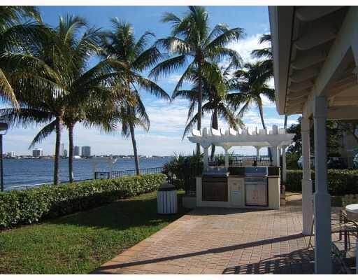 Photo of 1015 Lake Shore Drive #202, Lake Park, FL 33403 (MLS # B26079127)